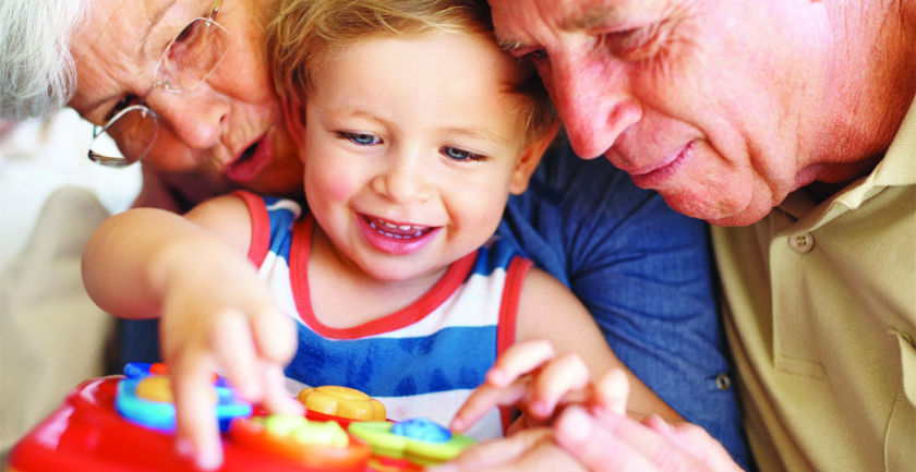 Young child with grandparents