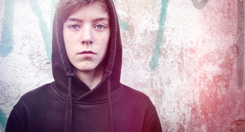 Teenage boy hood up Teenage boy hood up