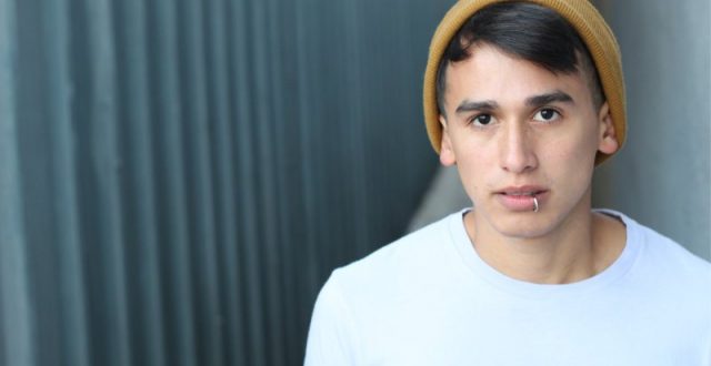 Teenage male wearing beany