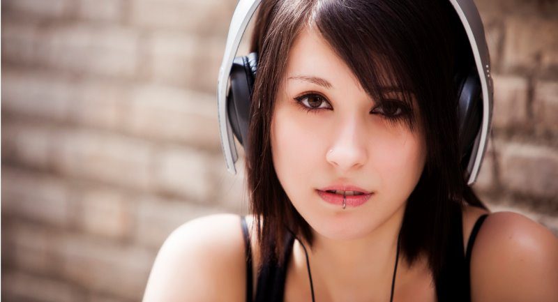 dark haired girl with headphones