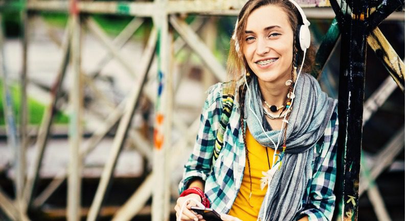 Teenage girl listening to music