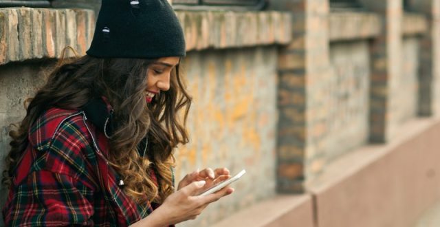 teenager-using-mobile-phone