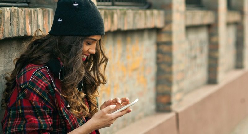 teenager-using-mobile-phone