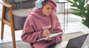 focused-hipster-teen-girl-school-college-student-pink-hair-wear-picture-id1239526742