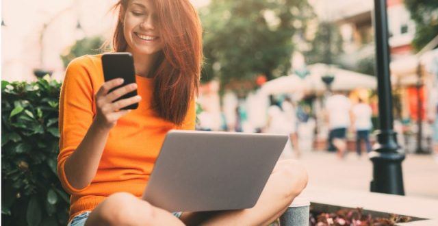 woman-texting-outdoor-picture-id594954910