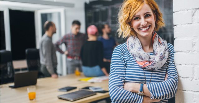 photo of young business woman in a conference room