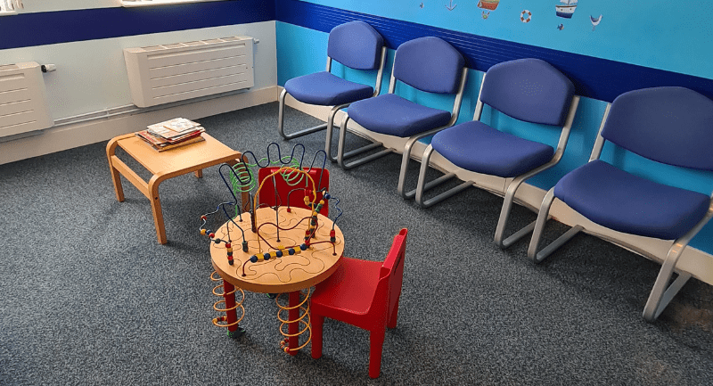 Arbroath waiting room with children's toys on the floor