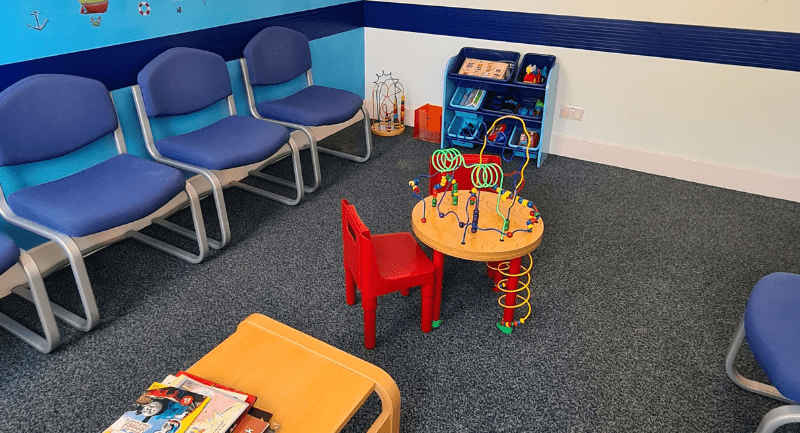 Arbroath waiting room with children's toys on the floor