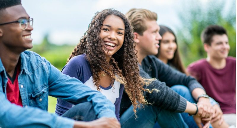 Group of teenagers laughing